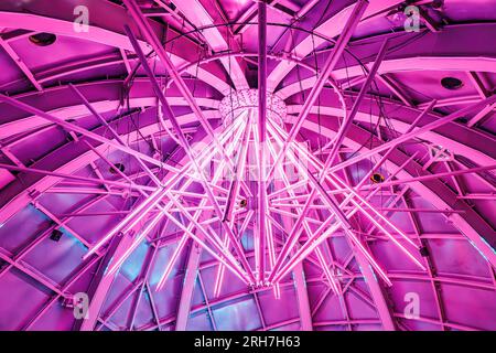 Brussels, Belgium-June, 15, 2023: Lights decoration inside the Atomium of Brussels, a modernist building that represents a silver atom model. Centrepi Stock Photo