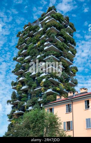 View of the balconies and terraces of Bosco Verticale, full of green plants. Spring time. 0808-2023. Milan, Porta Nuova skyscraper residences, Italy. Stock Photo