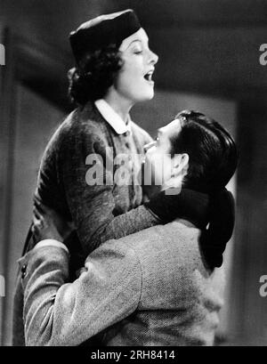 Myrna Loy, Clark Gable, on-set of the Film, 'Test Pilot', MGM, Loew's Inc., 1938 Stock Photo