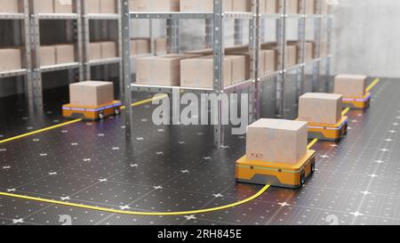 Robots move along the shelves with boxes along the yellow line. AGV robots delivering cardboard boxes to a logistics distribution center. Automated AG Stock Photo