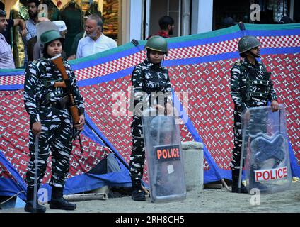 Srinagar, India. 14th Aug, 2023. Indian women paramilitary soldiers guard as Jammu and Kashmir Lieutenant Governor Manoj Sinha arrives to inaugurate a newly renovated market in Srinagar, Indian controlled Kashmir. Security has been beefed up in the region ahead of India's Independence Day celebrations on 15 August. (Photo by Mubashir Hassan/Pacific Press) Credit: Pacific Press Media Production Corp./Alamy Live News Stock Photo