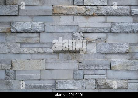 grey limestone wall - front view, many blocks for texture background Stock Photo