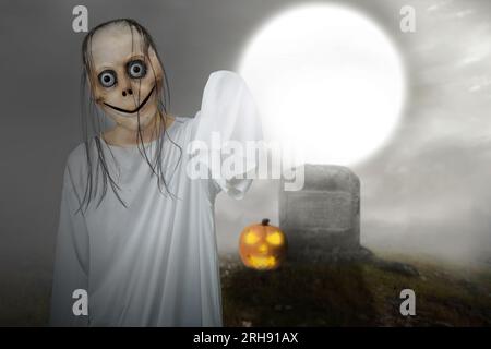 Scary Momo standing behind the wall in the dark background. Scary face for  Halloween. Halloween concept Stock Photo - Alamy