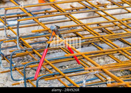 Close-up of steel reinforcement cage assembled by steel fixer and ready to be moved to place of work inside shutter Stock Photo