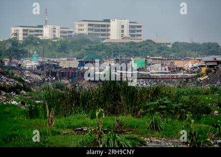 Electronic scrap processing in Agbogbloshie takes place in the district of the same name in the metropolis of Accra in West African Ghana. Dump, Waste Stock Photo