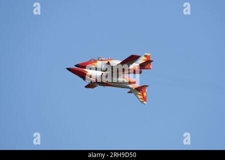 Two Casa C-101 Aviojet jet trainers of the Spanish Air Force Patrulla Aguila Aerobatic Display Team in very close formation a the RIAT Stock Photo