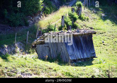 Dilapidated wooden shed on an Austrian Hillside. Stock Photo