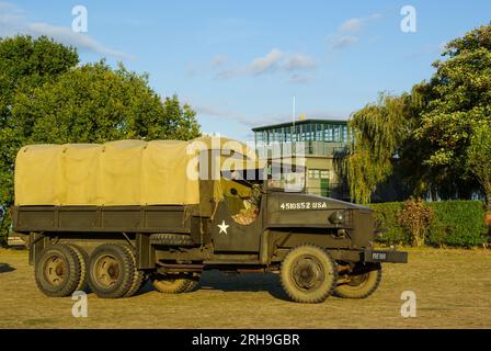 Second World War American military Studebaker 2½-ton 6×6 truck on show at Rougham Airfield at sunset. Former USAAF airbase Stock Photo