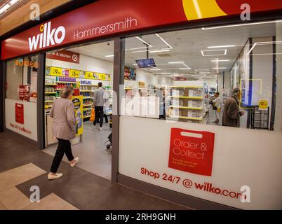 London, UK 15 Aug 2023 Wilko, which has been trading since 1930, has more than 400 shops and employs 12,500 workers. Shoppers are rushing to Wilko for bargains after the business announced its administration sale. Signs can be seen in Wilko stores across the UK stating 'Wilko Administration Sale ' and '1000s of reductions throughout the store.' The Worksop-based business confirmed on Thursday, August 10, that the business was entering administration, a week after it had filed a Notice of Intention. The decision has left 12,000 employees at risk as well as over 400 stores across the UK. Bidder Stock Photo