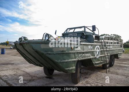 American DUKW amphibious vehicle at a wings & wheels event at the rural airfield of Shipdham, formerly WWII RAF Shipdham, in Norfolk, UK. GMC truck Stock Photo