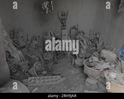 many ancient African statues of a tribe are in storage traditional African statues made out of wood Stock Photo