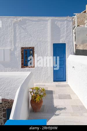 Blue door, white wall and balcony, Fira, Santorini, Greece Stock Photo