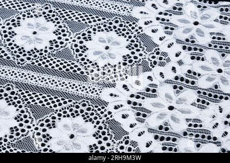 fabric texture. mesh texture. flower fabric texture. string texture, mesh cloth. black synthetic fabric. can be used as a background Stock Photo