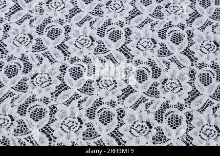 fabric texture. mesh texture. flower fabric texture. string texture, mesh cloth. black synthetic fabric. can be used as a background Stock Photo