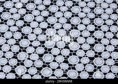 fabric texture. mesh texture. flower fabric texture. string texture, mesh cloth. black synthetic fabric. can be used as a background Stock Photo