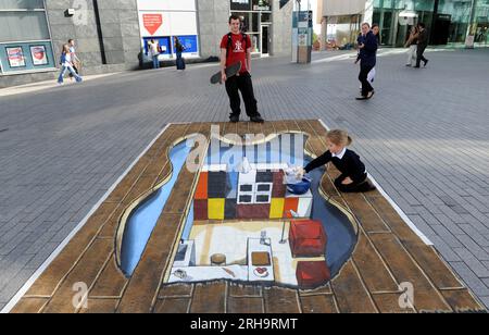 To celebrate the launch of the new 2010 catalogue IKEA brought the pages to life on the streets of Birmingham today. Stock Photo