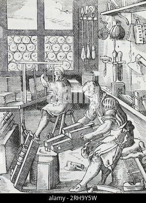 15th Century Bookbinder's workshop. Engraving from Lives of the Saints by Sabin Baring-Gould. Stock Photo