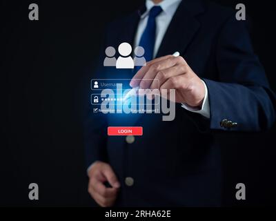 Businessman using pen to enter password at login screen. Represents protection from outside hacking. The concept of code protection. Viruses, firmware Stock Photo