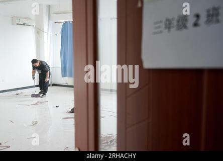 14th Aug, 2023. High school pitcher Jang Hyun-seok signs with Dodgers Jang  Hyun-seok (L), a 19-year-old right-handed pitcher for Masan Yongma High  School, receives his No. 18 jersey from Jon Deeble, director