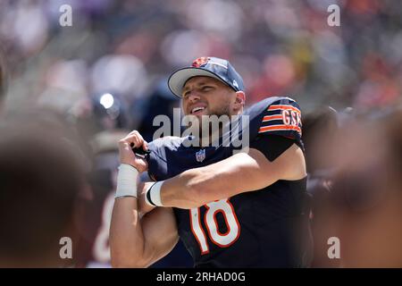 Chicago Bears offensive tackle Aviante Collins (74) blocks against the Tennessee  Titans during the first half of an NFL preseason football game, Saturday,  Aug. 12, 2023, in Chicago. (AP Photo/Kamil Krzaczynski Stock