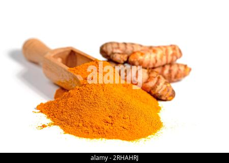Ground turmeric root against white background Stock Photo