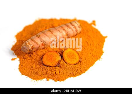 Ground turmeric root against white background Stock Photo