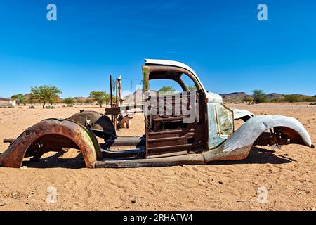 Namibia. Classic car wreck decaying in the desert Stock Photo - Alamy