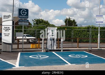 Slough, Berkshire, UK. 15th August, 2023. New GridServe dual charging electric vehicle charging points are being installed at the Slough Retail Park off the A4 Bath Road in Berkshire. Credit: Maureen McLean/Alamy Live News Stock Photo