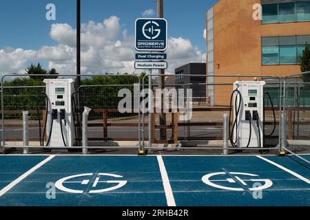 Slough, Berkshire, UK. 15th August, 2023. New GridServe dual charging electric vehicle charging points are being installed at the Slough Retail Park off the A4 Bath Road in Berkshire. Credit: Maureen McLean/Alamy Live News Stock Photo