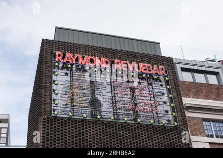 Illuminated neon sign outside the former Raymond Revue bar on Brewer Street, Soho, Central London, England, U.K. Stock Photo
