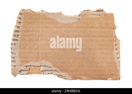A piece of textured packaging cardboard. Piece of torn cardboard with copy space. Brown wrapping vintage paper, isolated top view. Kraft paper isolate Stock Photo