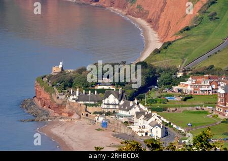 Looking west from Salcombe Hill over the town of Sidmouth, while walking on the South West Coast path, towards Ladrum Bay on the jurassic coast in Dev Stock Photo