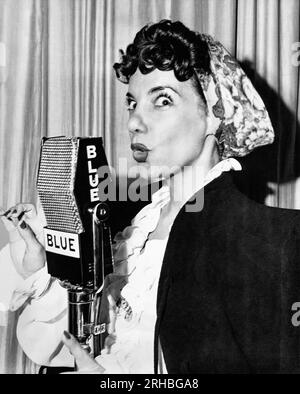 New York, New York:  January 14, 1945 Carmen Miranda appearing on the BLUE Radio Network with Jimy Durante and Arthur Treacher. Stock Photo