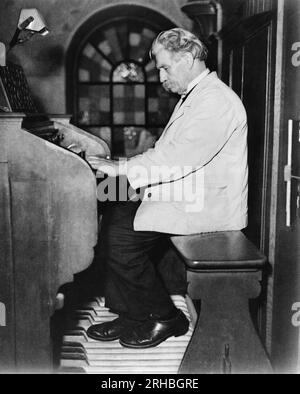 Europe:  c. 1950 Nobel Peace Prize laureate, musician, philosopher, physician, and missionary Albert Schweitzer as he plays an organ recital to raise money for his work in Africa. Stock Photo