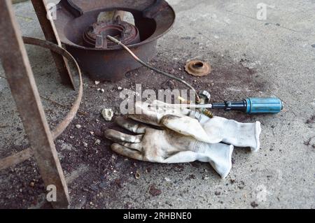 Scrub rusted steel that is stuck. Stock Photo