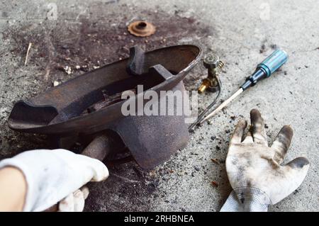 Scrub rusted steel that is stuck. Stock Photo