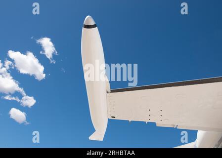 Close-up of a business jet with wingtip pods in flight Stock Photo