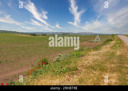 Landscape with modern agricultural irrigation system in the field Stock Photo