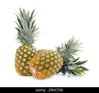 Two delicious ripe pineapples isolated on white Stock Photo