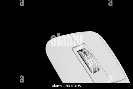 close up shot detail wheel of wireless computer mouse , made from stainless steel, Black background Stock Photo