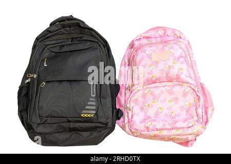 Black and Pink school bag on white isolated background. Boy and girl school bag set concept. Stock Photo
