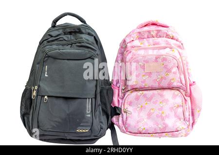 Boys and girls theme backpacks isolated on white background Stock Photo