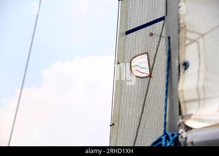 Parts of a sailboat that is sailing on the lake with sails out, bow ...