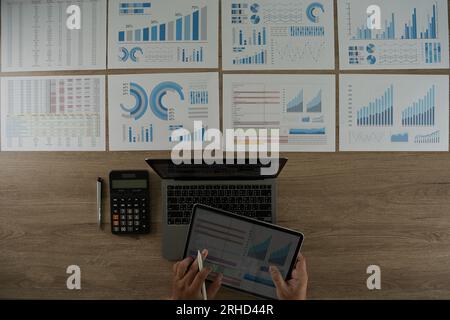 businessman working data document graph chart report chart suitable for financial investment analyzing financial and investment data Stock Photo