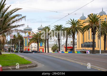 Luna park and Palais theatre with palm trees and road. St Kilda, Victoria, Australia Stock Photo