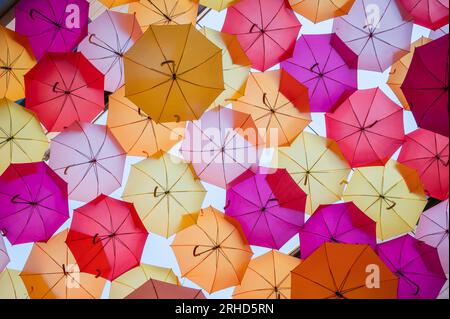 A Bunch of cute and colorful Umbrellas Stock Photo