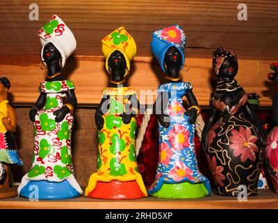 Colorful clay dolls painted in vibrant colors for sale to tourists in Northeast Brazil Stock Photo Alamy