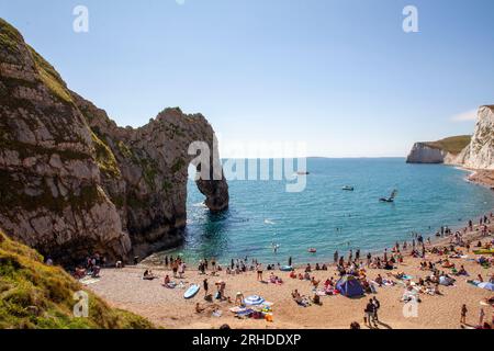Durdle Door (sometimes written Durdle Dor ) is a natural limestone arch on the Jurassic Coast near Lulworth in Dorset, Stock Photo