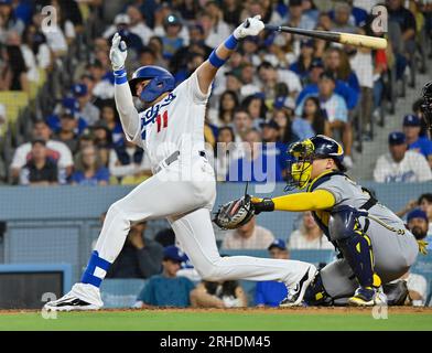 Los Angeles, United States. 15th Aug, 2023. Los Angeles Dodgers Miguel Rojas hits an RBI single against the Milwaukee Brewers during the sixth inning at Dodgers Stadium in Los Angeles on Tuesday, August 15, 2023. Photo by Jim Ruymen/UPI Credit: UPI/Alamy Live News Stock Photo