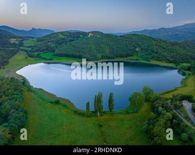 Aerial view of the Montcortès lake on a summer sunrise (Pallars Sobirà, Lleida, Catalonia, Spain, Pyrenees) ESP: Vista aérea del lago de Montcortès Stock Photo